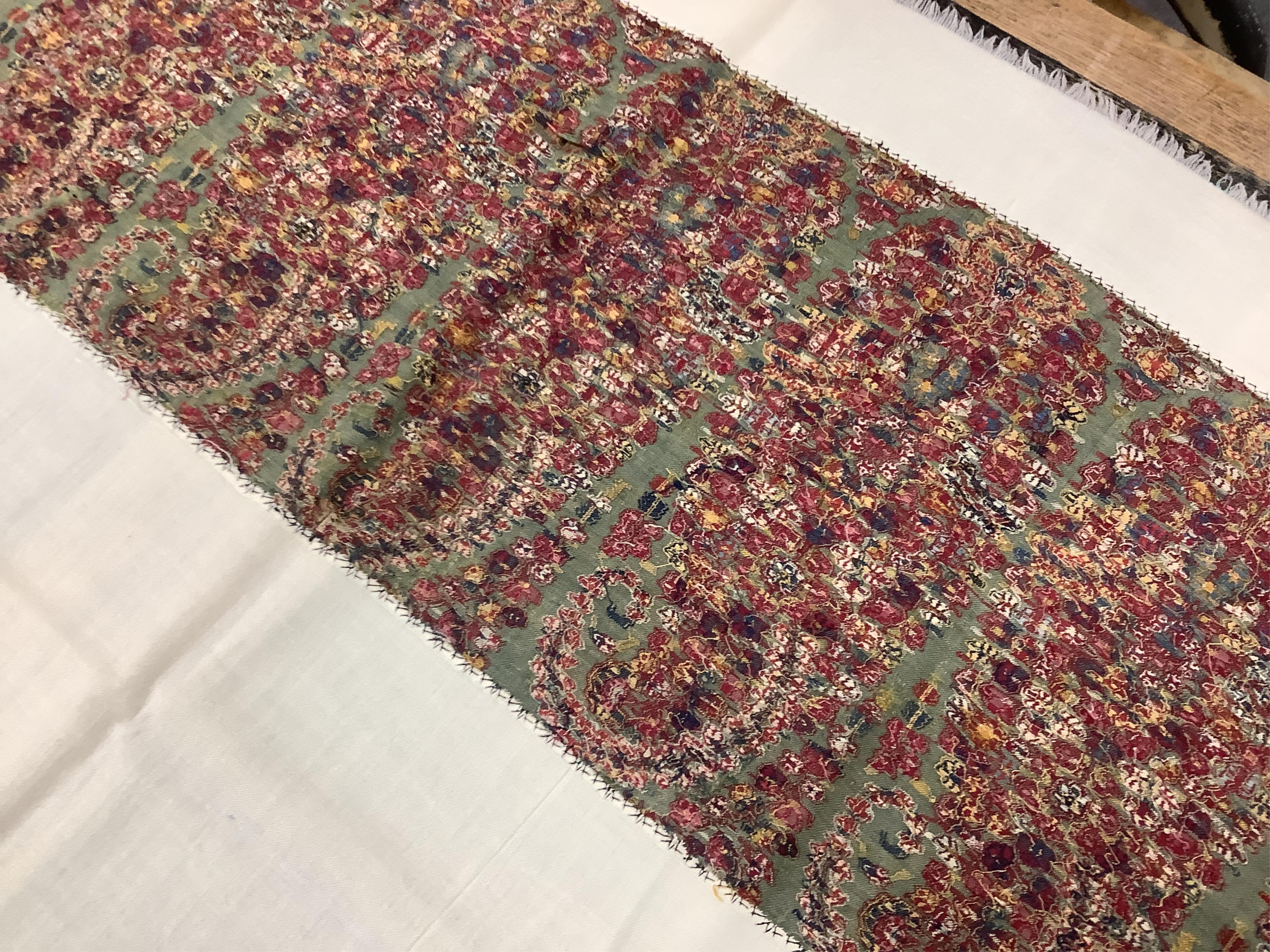 A cream pashmina shawl with woven Paisley ends, 223x104cm